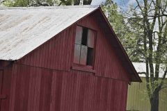 This is an old farm shed  early in the morning that has taken it place in history.