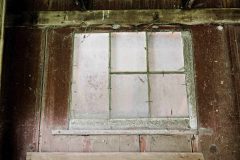 This is a window in a farm building that has stood up to the test of time.